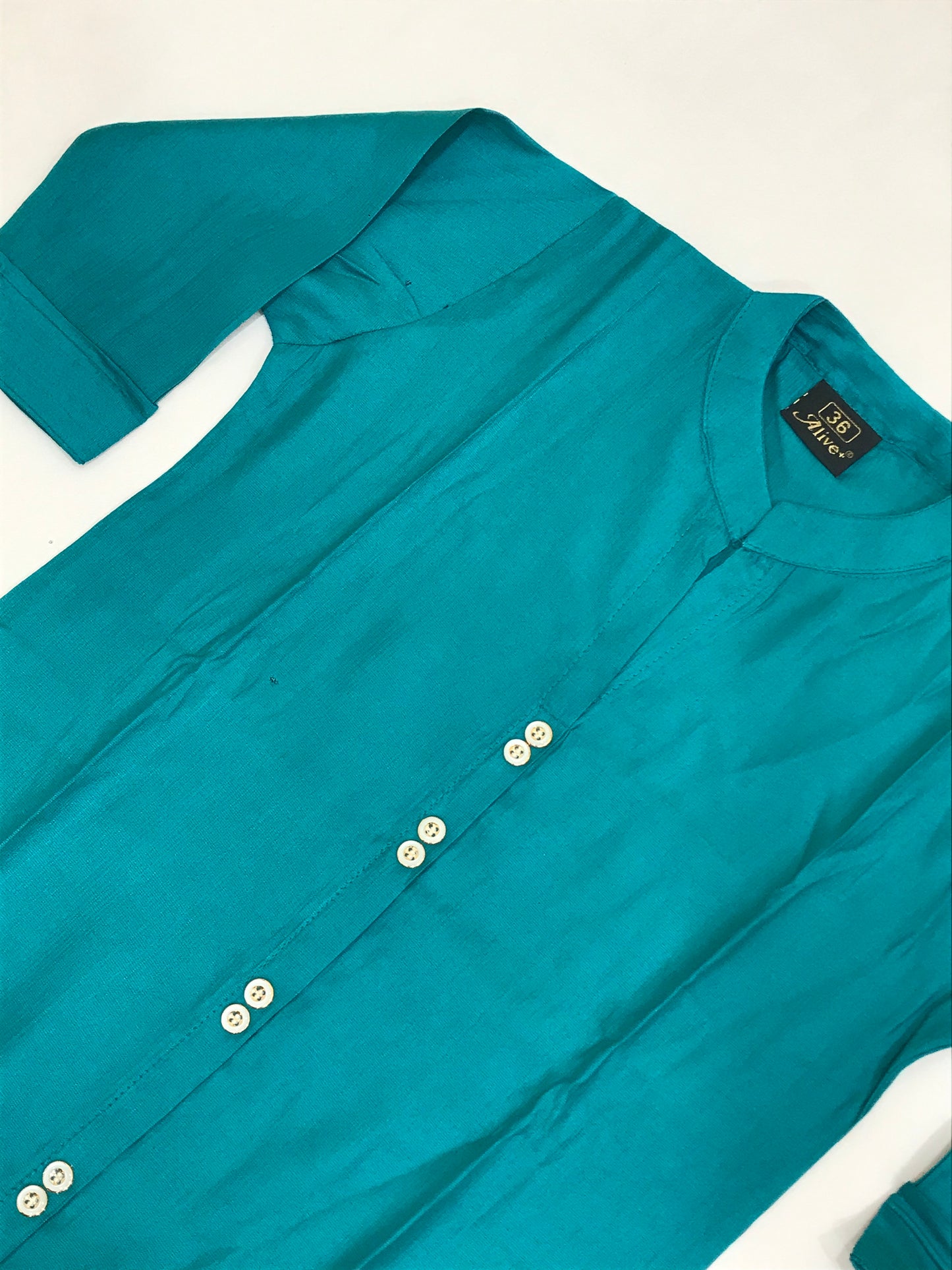 Rama Green Color Self Design Cotton Kurti In Yuma