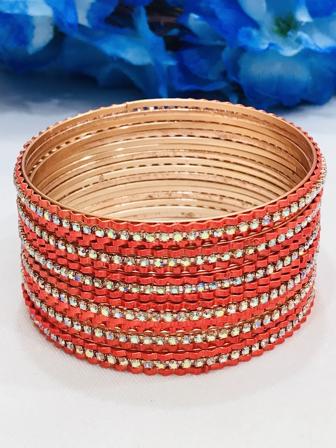 Dazzling Red Color Stone Worked Party Wear Metal Bangles For Women