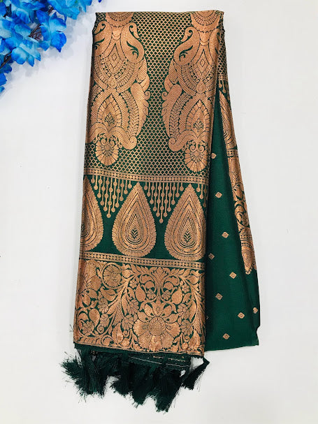 Elegant Green color Soft Silk Saree With Butta Motifs And Rich Pallu With Tassels For Women