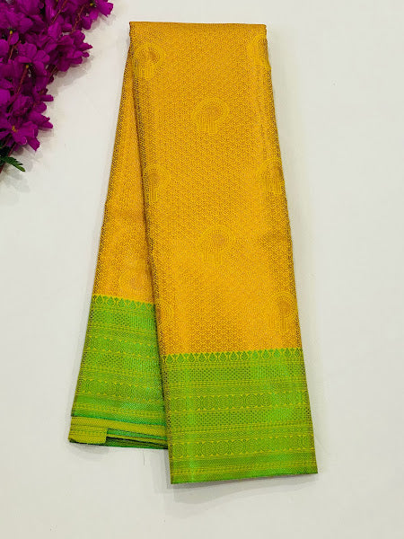 Appealing Yellow Color Brocade Art Silk Saree With Green Contrast Borde