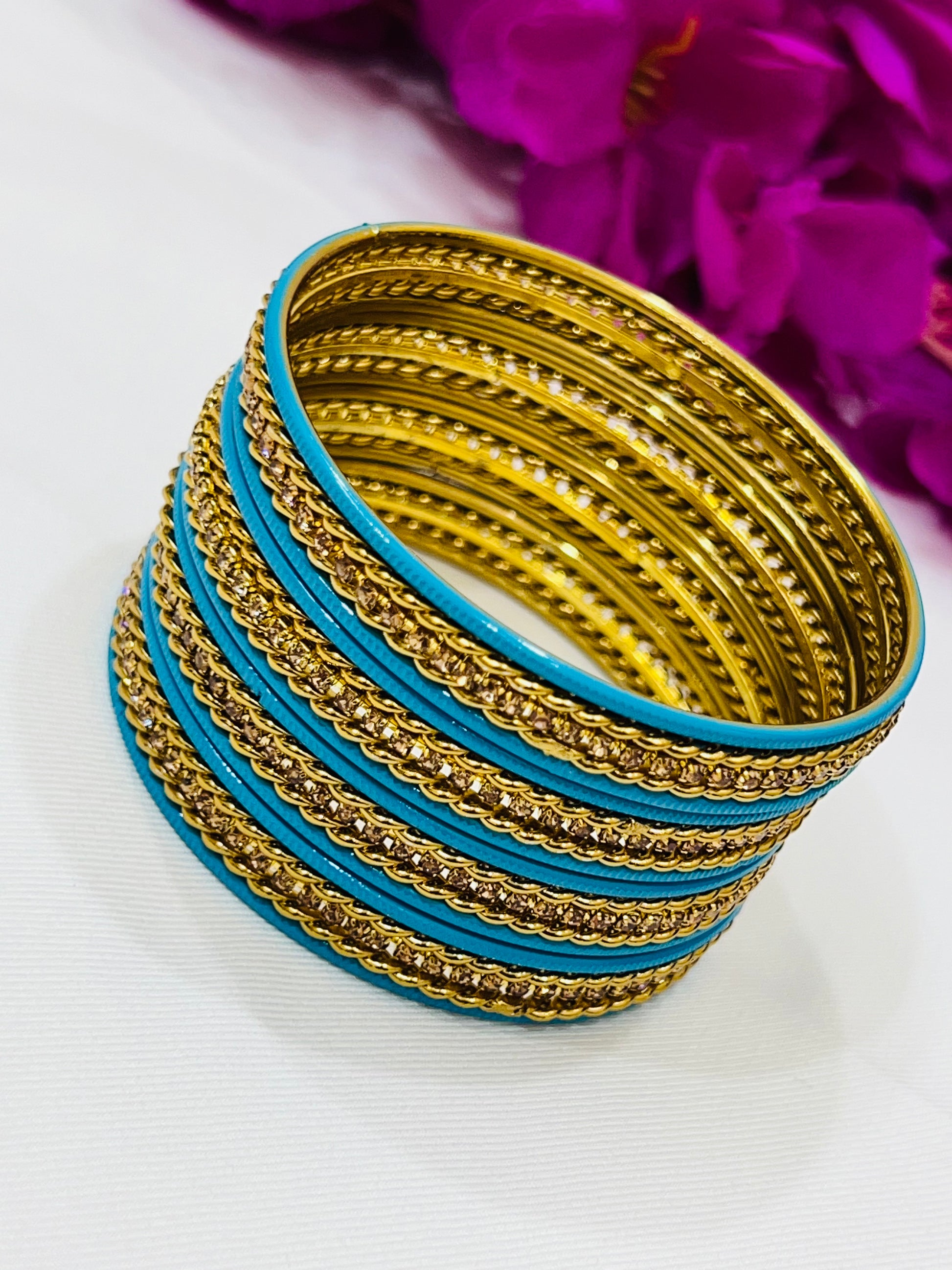 Lovely Sky Blue Color Metal Bangles With Gold Spiral Design In Tucson