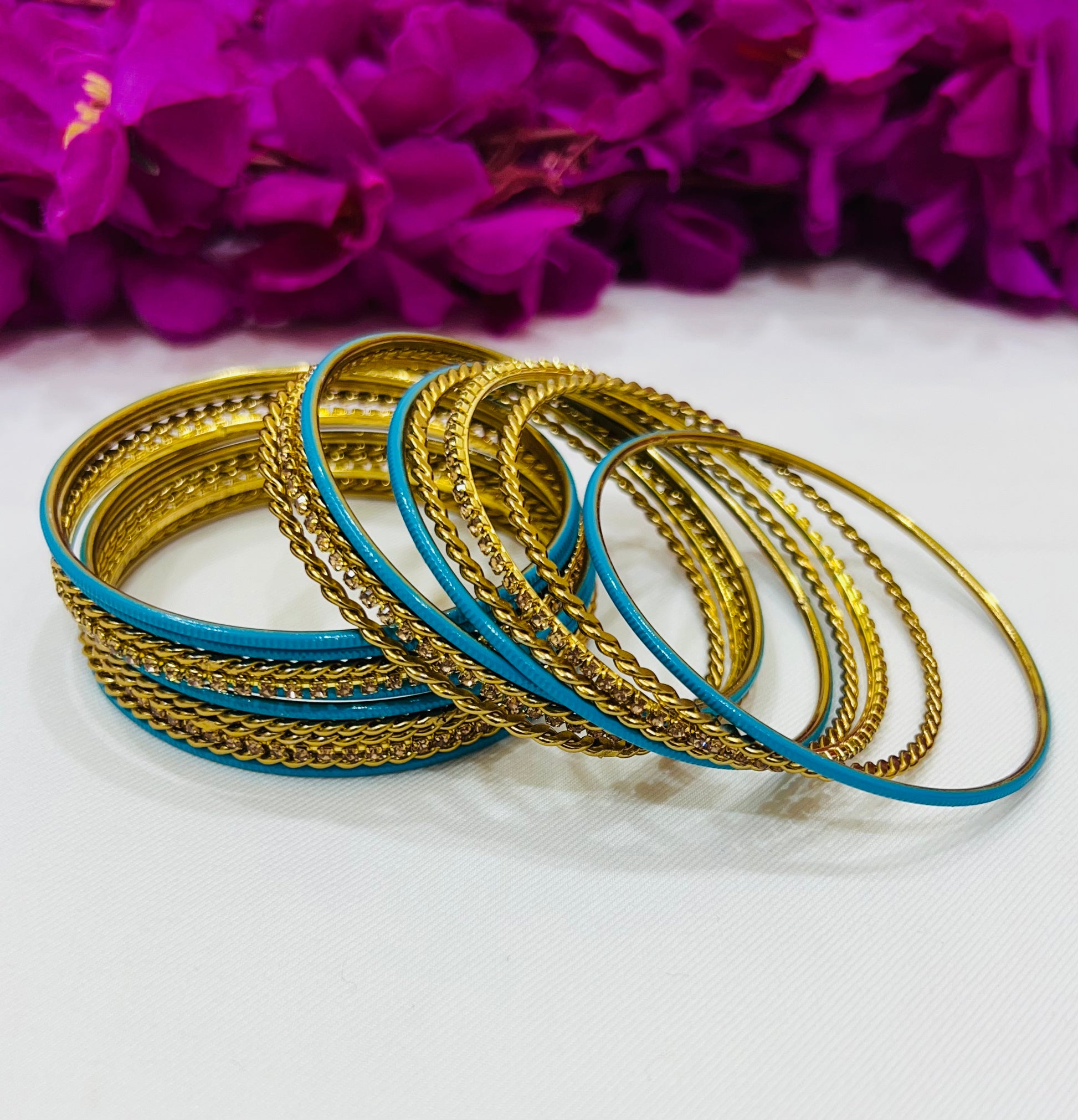 Sky Blue Color Metal Bangles With Gold Spiral Design In Mesa