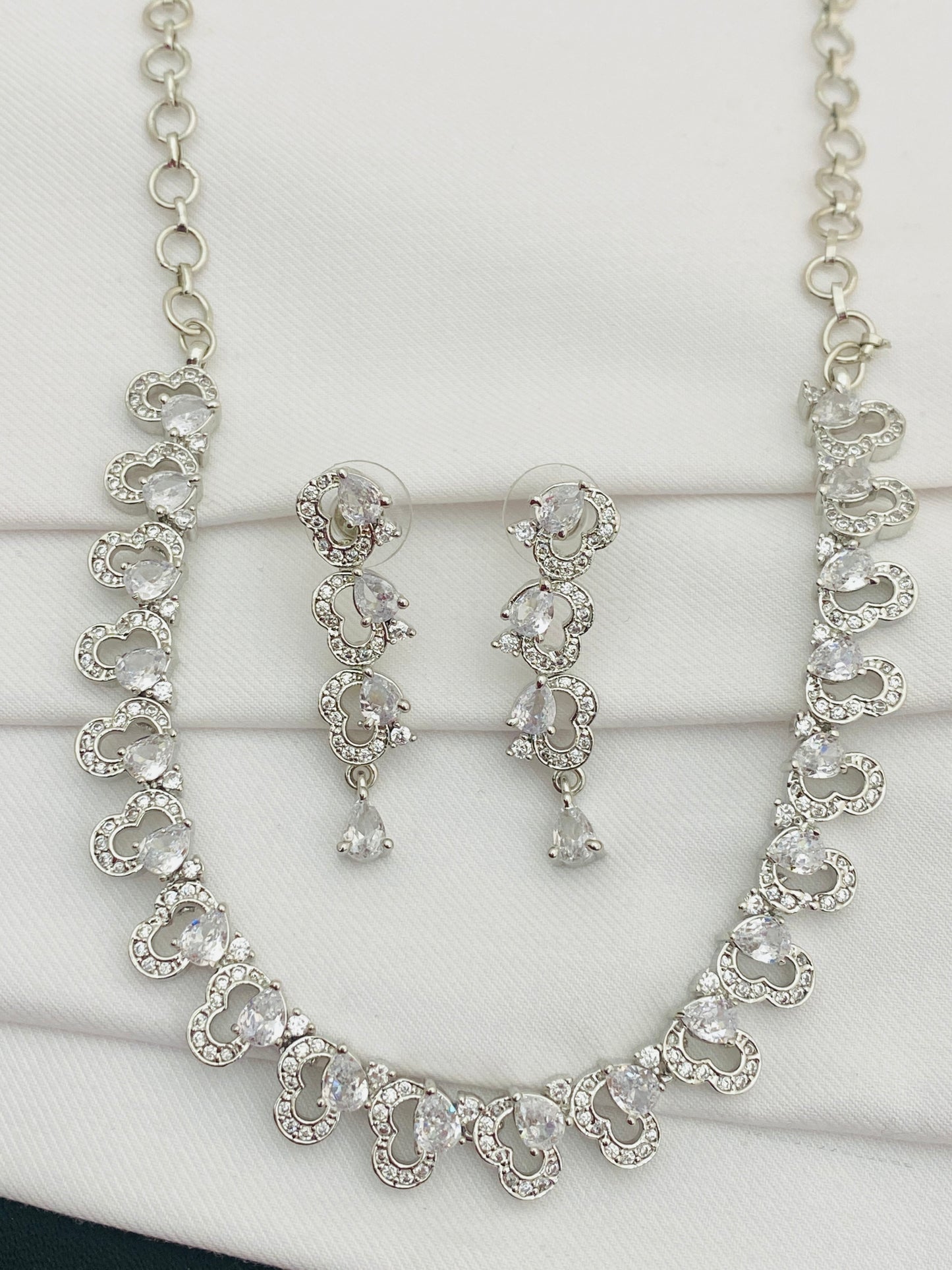 Party Wear Heart Designed Necklace And Earrings With AD Stones In Paradise Valley