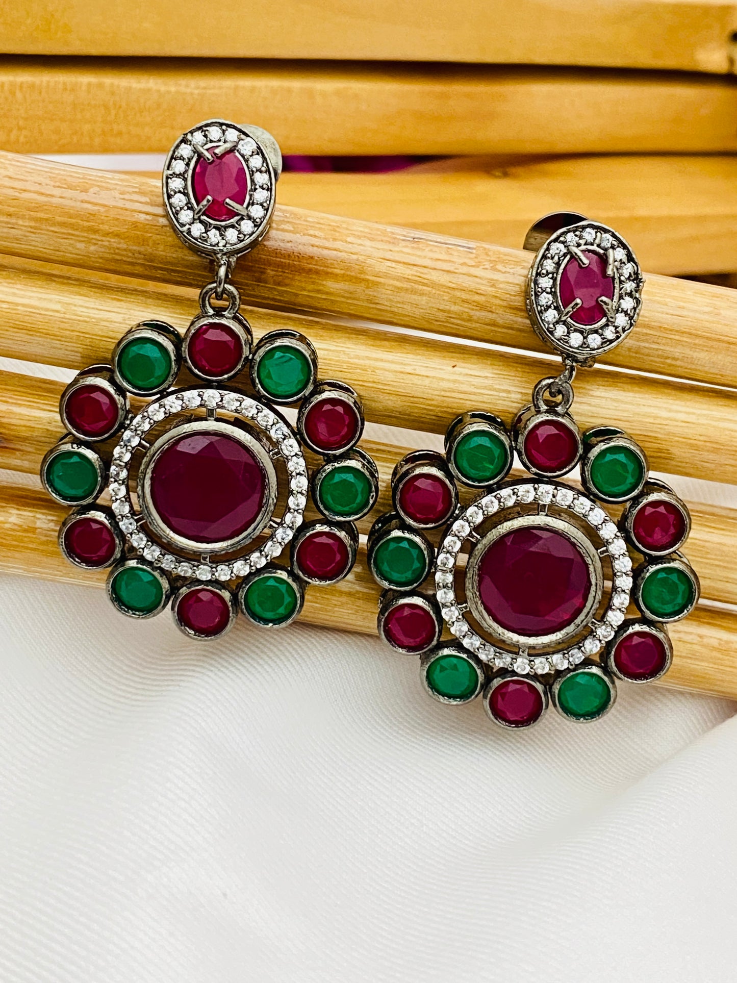 Emerald And Ruby Stone Studded Floral Design Earrings In Yuma