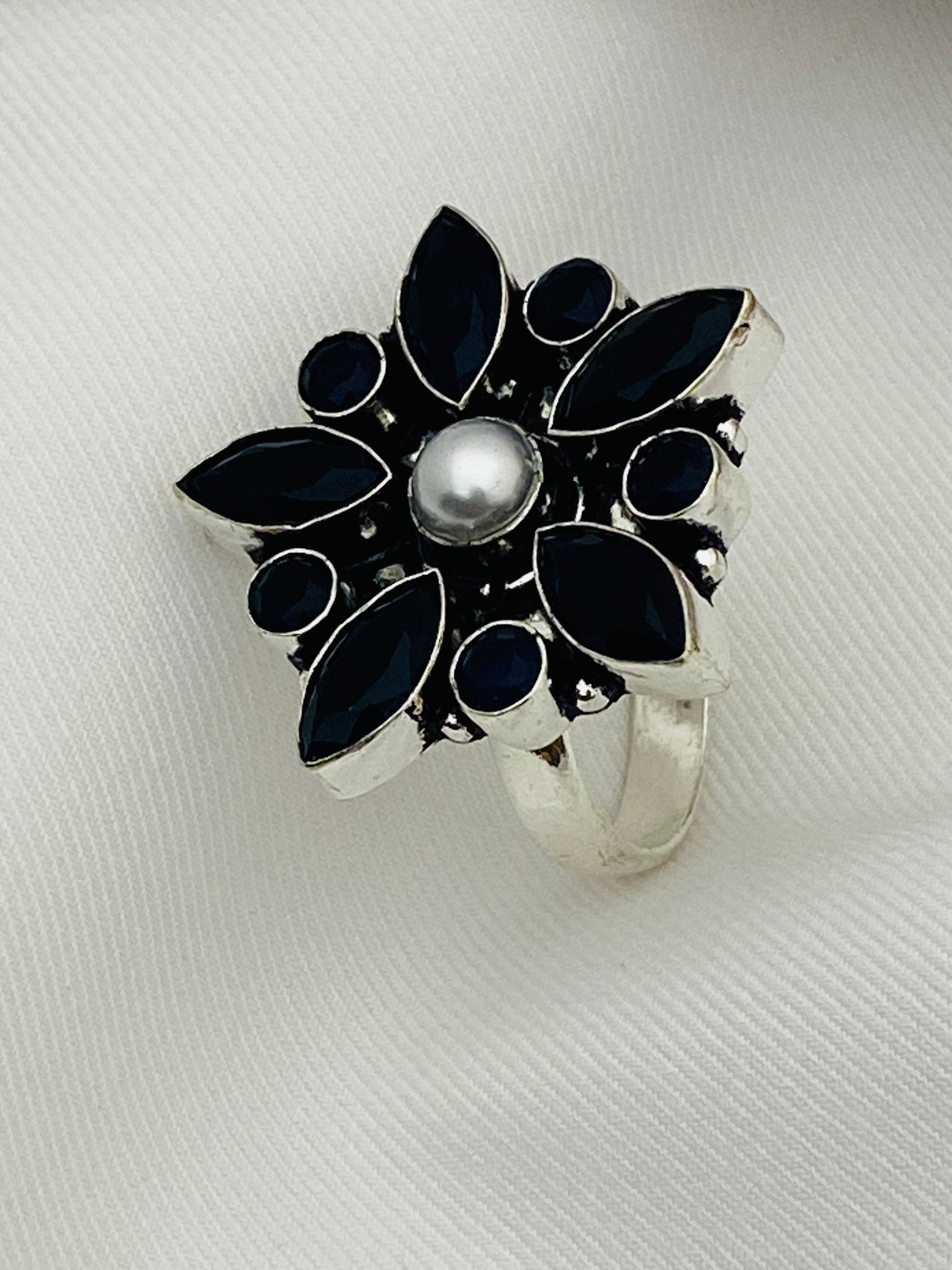 Alluring Black Stone Studded Floral Designed Adjustable Rings With Pearl Bead