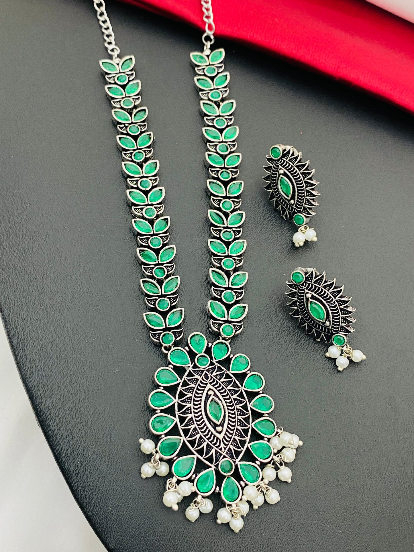 Appealing Emerald Stone Studded Tribal Ethnic Oxidized Silver Necklace With Earrings