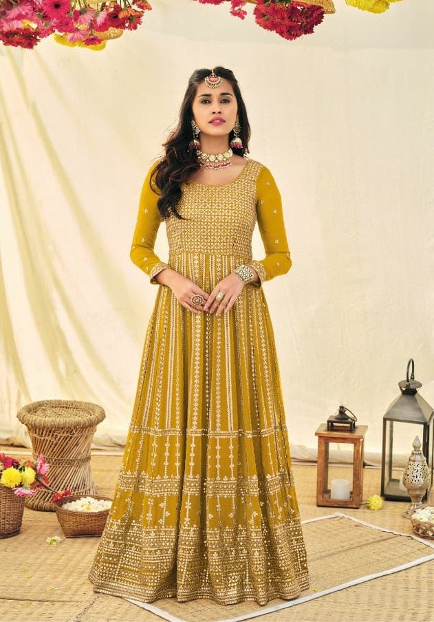Attractive Mustard Yellow Colored Party Wear Georgette Long Kurtis And Suits For Women