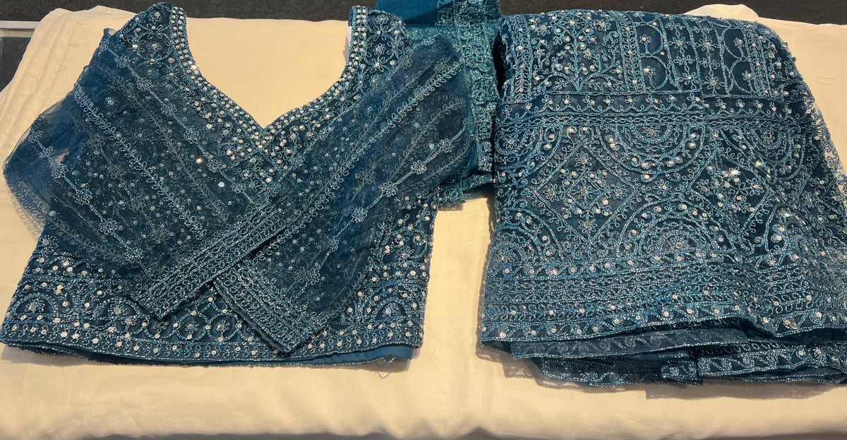 Stunning Teal Blue Color Net With Embroidery And Silver Zari Work Lehenga For Women