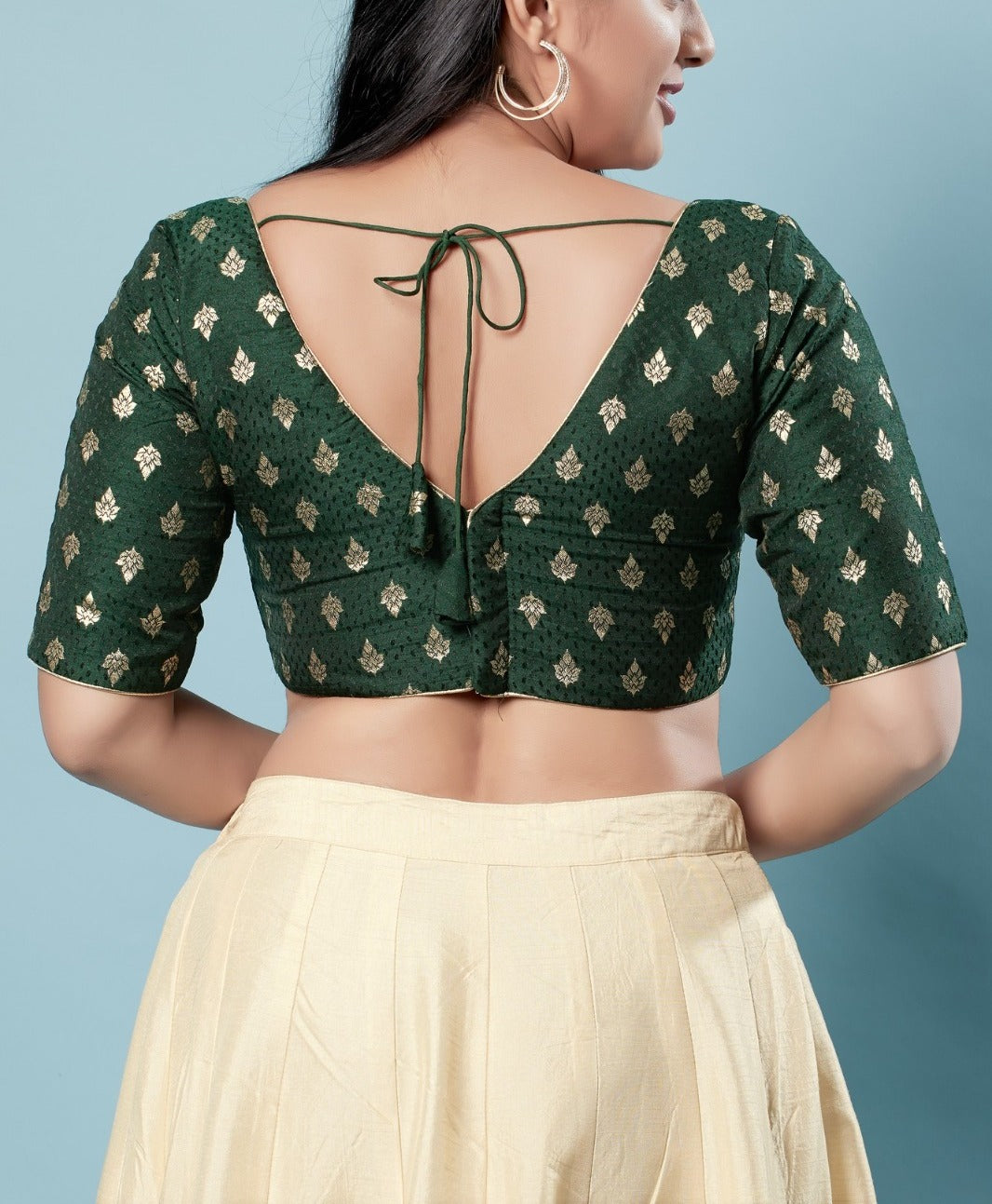 Appealing Green Colored V Neck And Back Open Blouse With Butta Motifs For Women Near Me