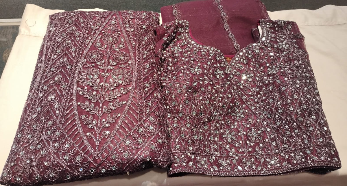 Alluring Wine Color Net With Embroidery, Mirror And Stone Work Lehenga For Women