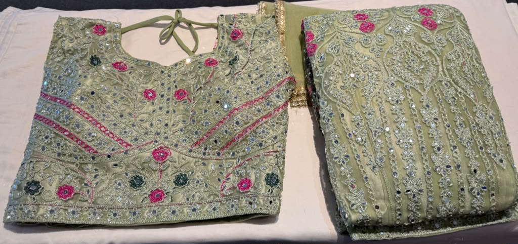 Amazing Sage Green Color Net With Embroidery And Mirror Work Lehenga For Women