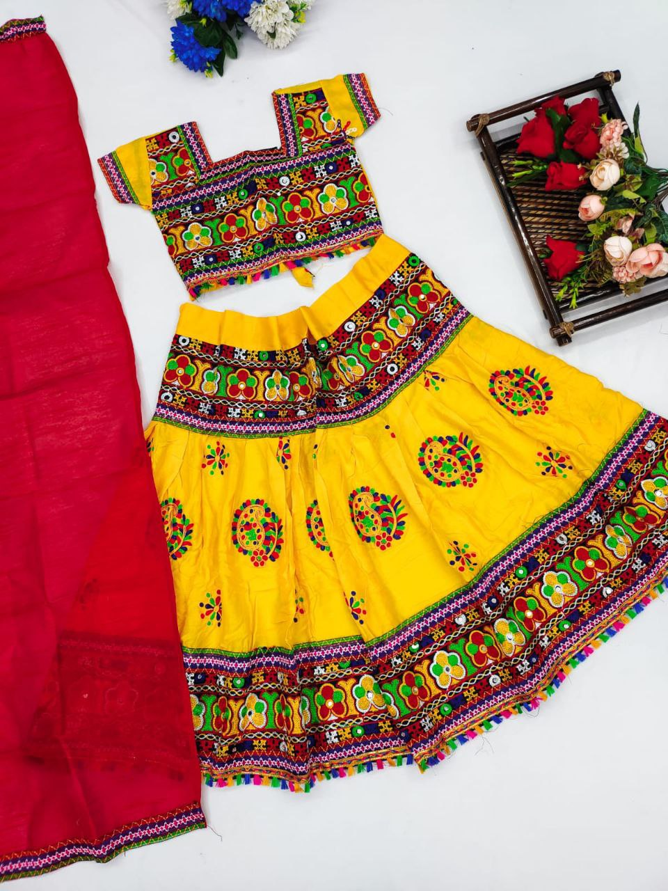 Fabulous Yellow Color Mirror Work Lehenga Choli For Kids