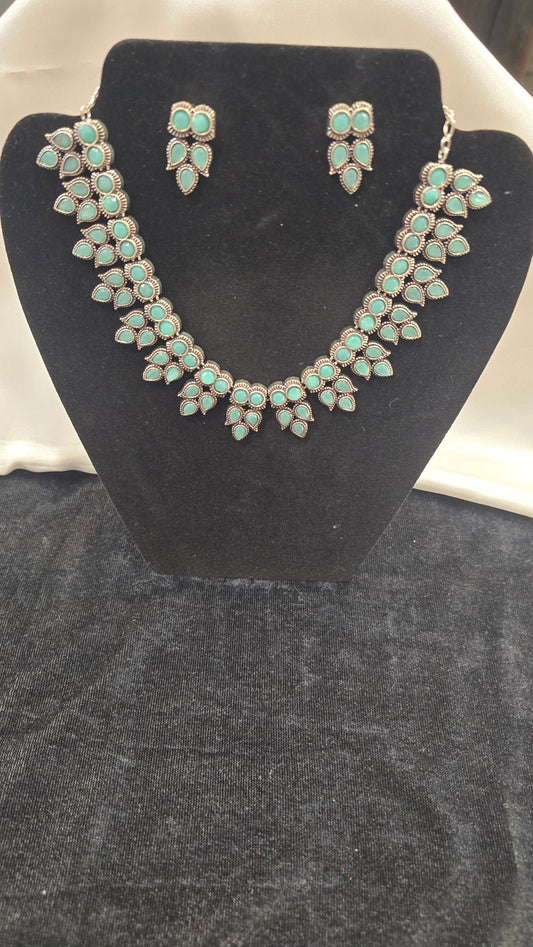 Appealing Pista Green Color Owl Shaped Oxidized Set