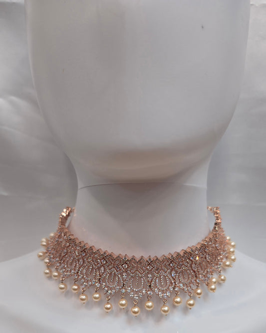 Alluring Rose Gold Plated White Color Stone Worked Necklace With Earrings Set