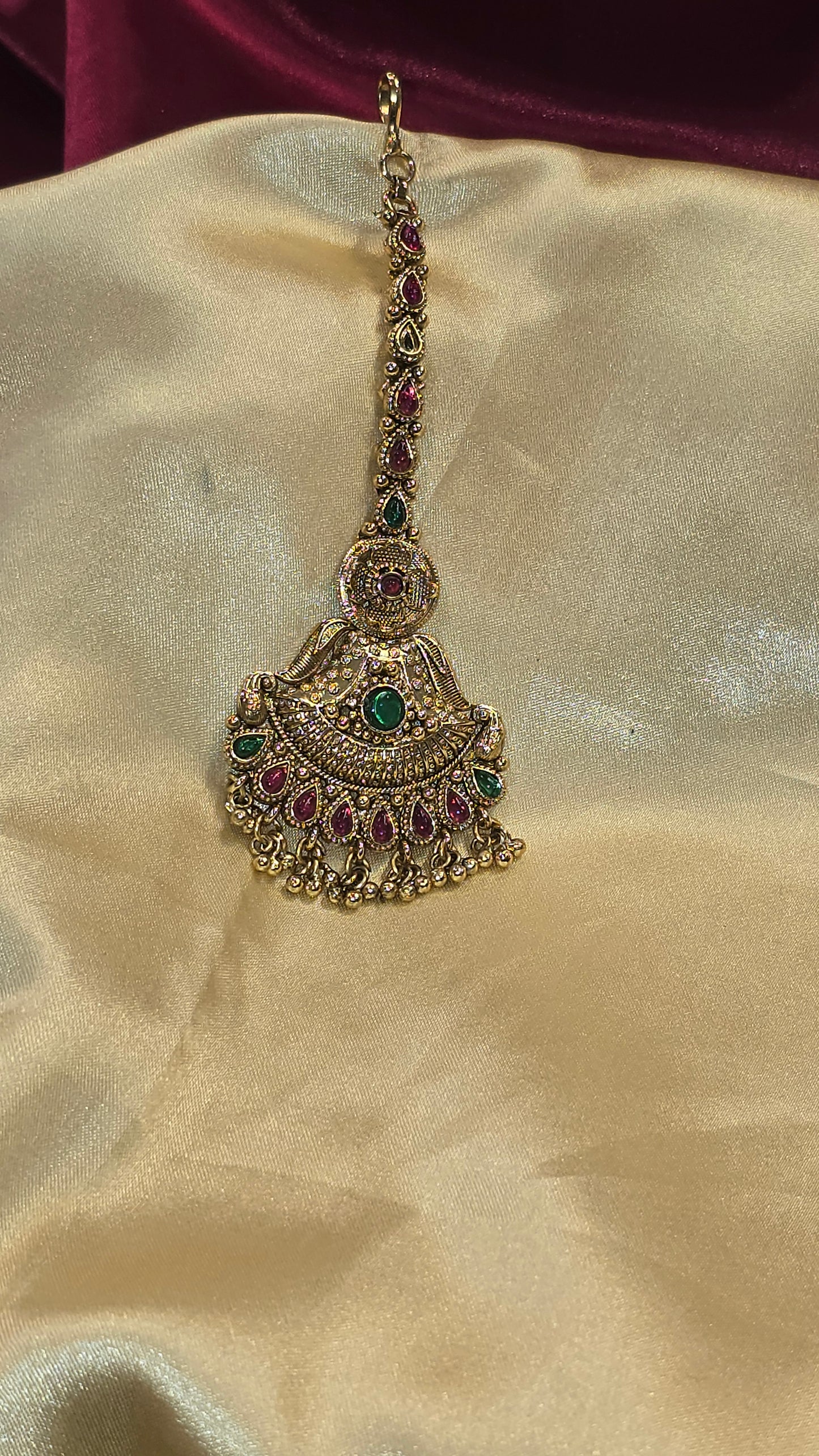 Marvelous Maroon And Green Stoned Tikka For Women