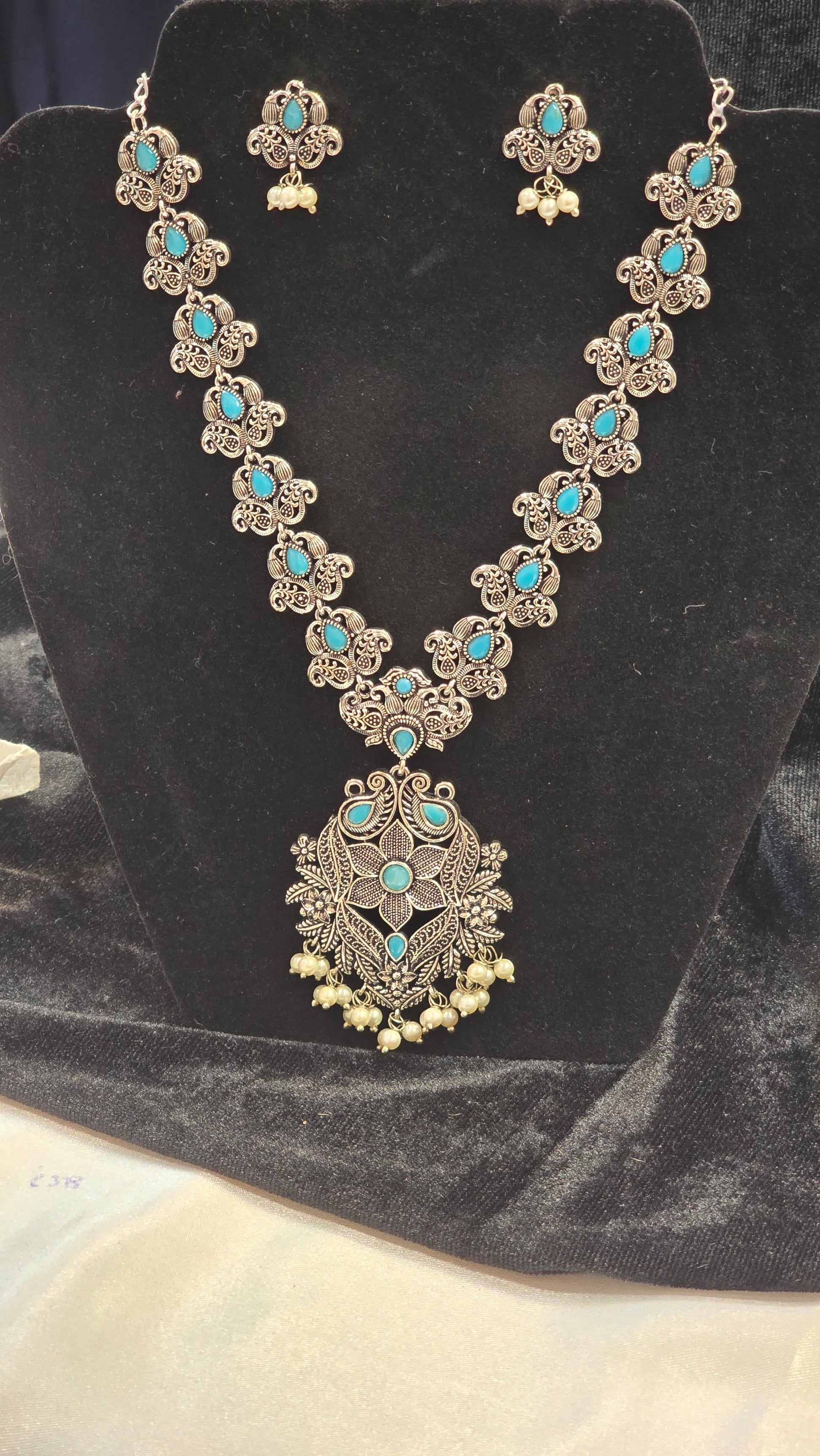 Mesmerizing Sky Blue Color Stoned Oxidized Necklace With Earrings Set