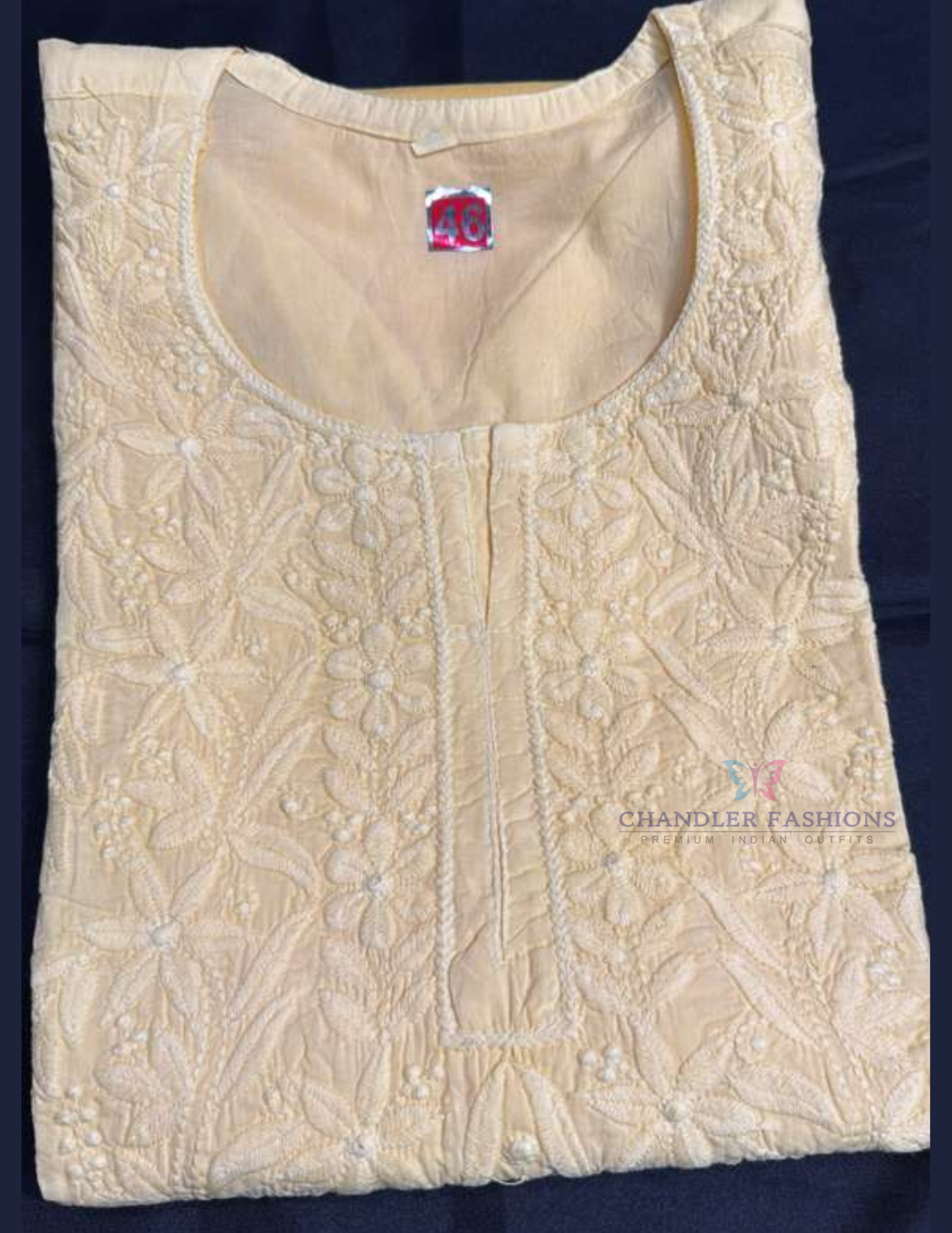 Charming Yellow Color Rayon With Embroidery Work Short Kurti For Women