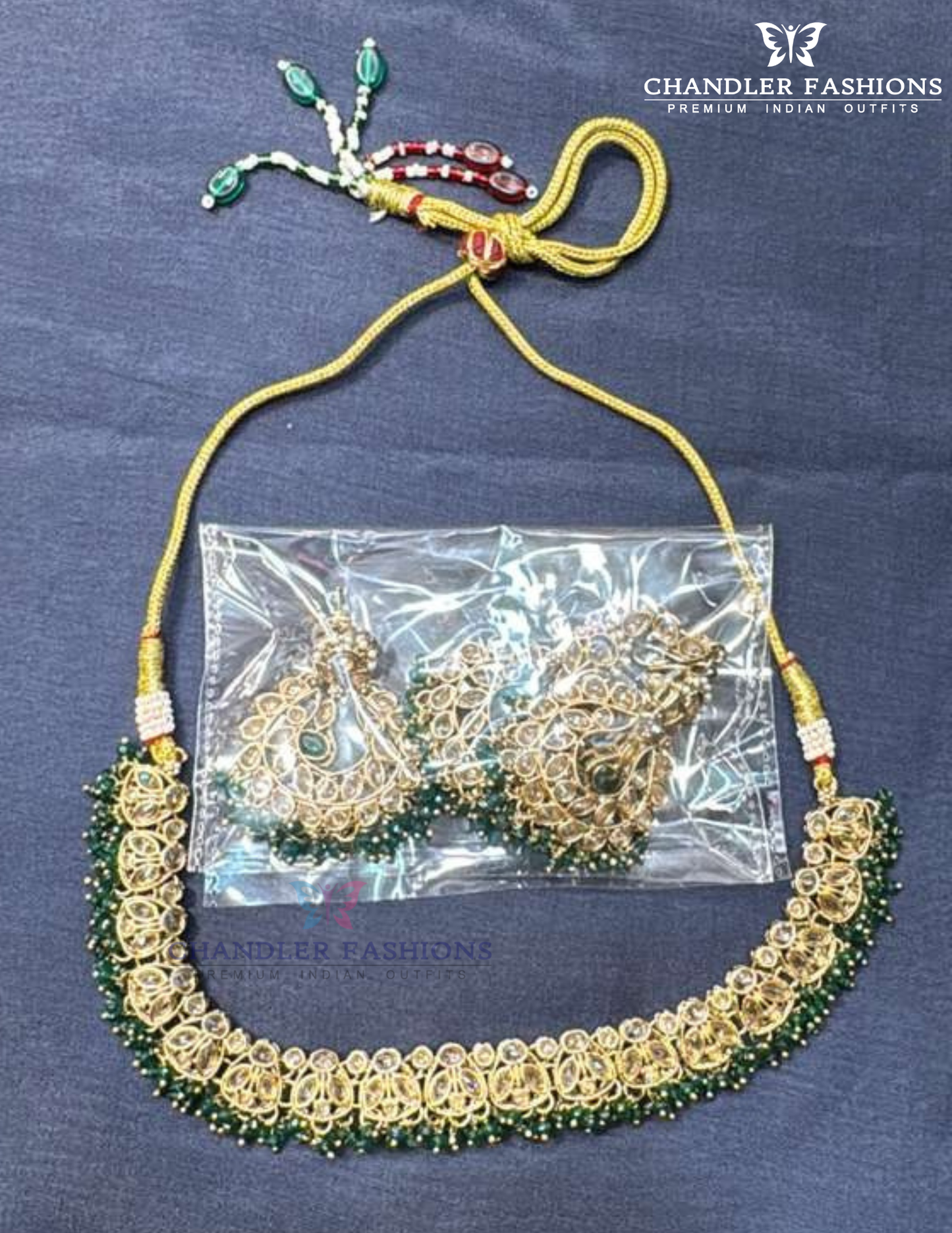 Charming Gold Plated Green Color Beads And Gold Stones Necklace With Earrings And Maang Tikka