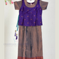 Pleasing Purple Colored Silk Langa Sets With Zari Work For Girls