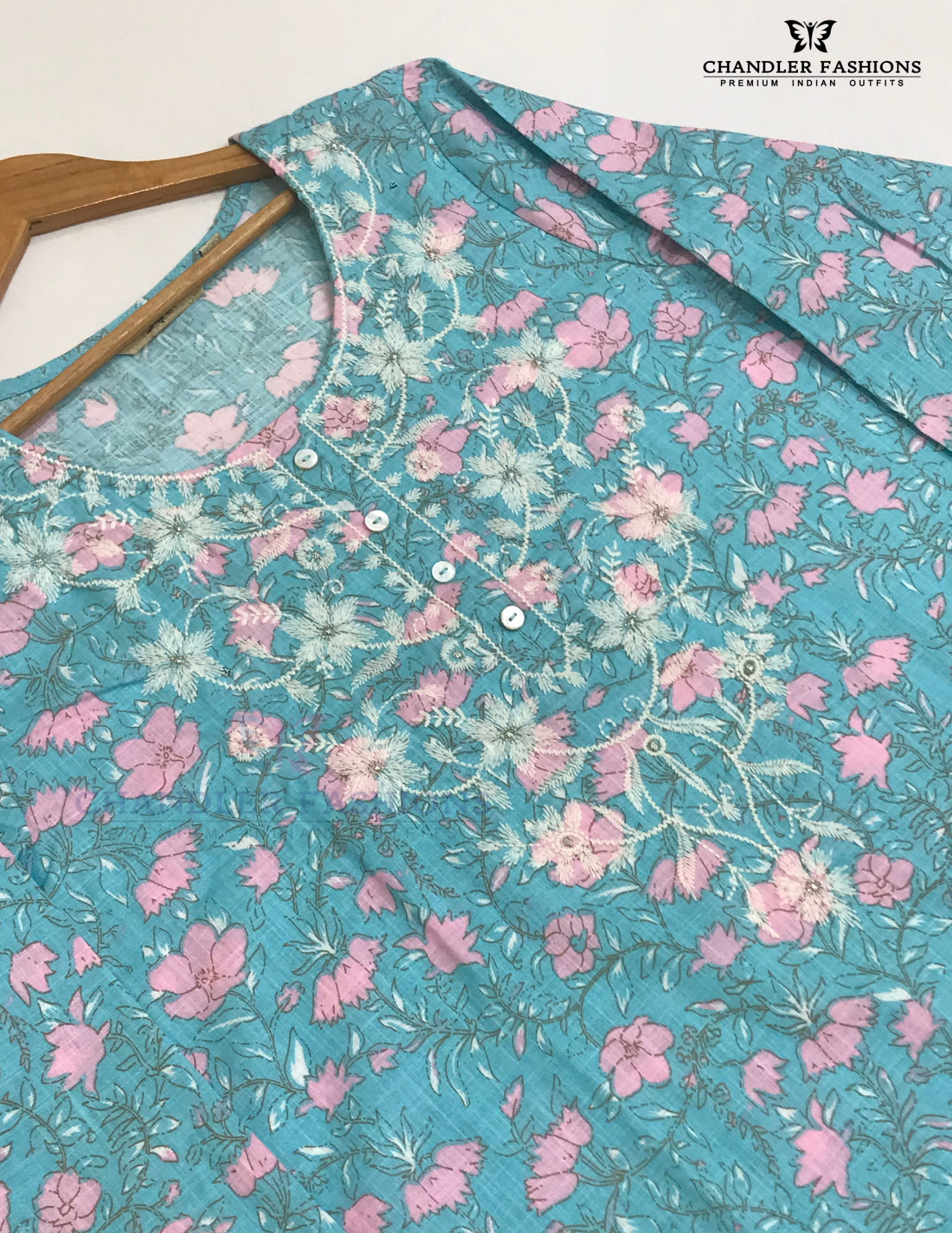 Sky Blue Color Cotton With floral And Embroidery Work Kurti In Suncity