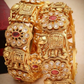 Alluring White And Red Color Stones Studded Gold Plated Bangles For Women