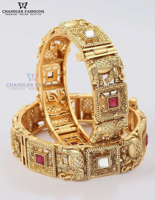 Wonderful Red And White Color Stones Elephant Design Gold Plated Bangles For Women