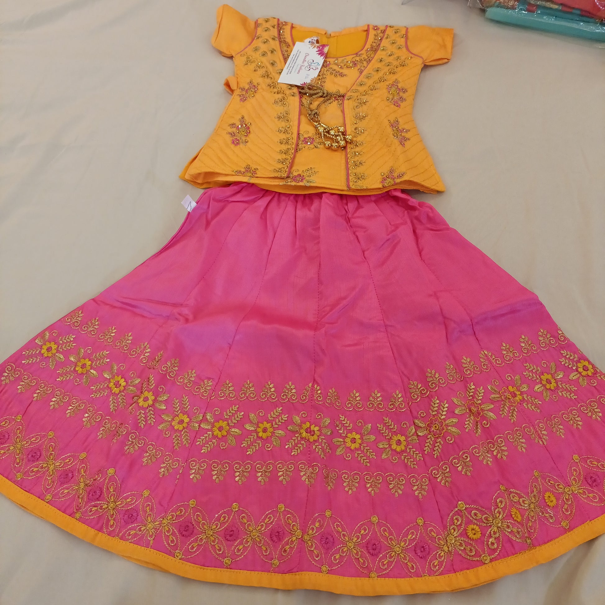 Alluring Yellow And Pink Embroidery And Stone Work Lehanga Choli In Yuma