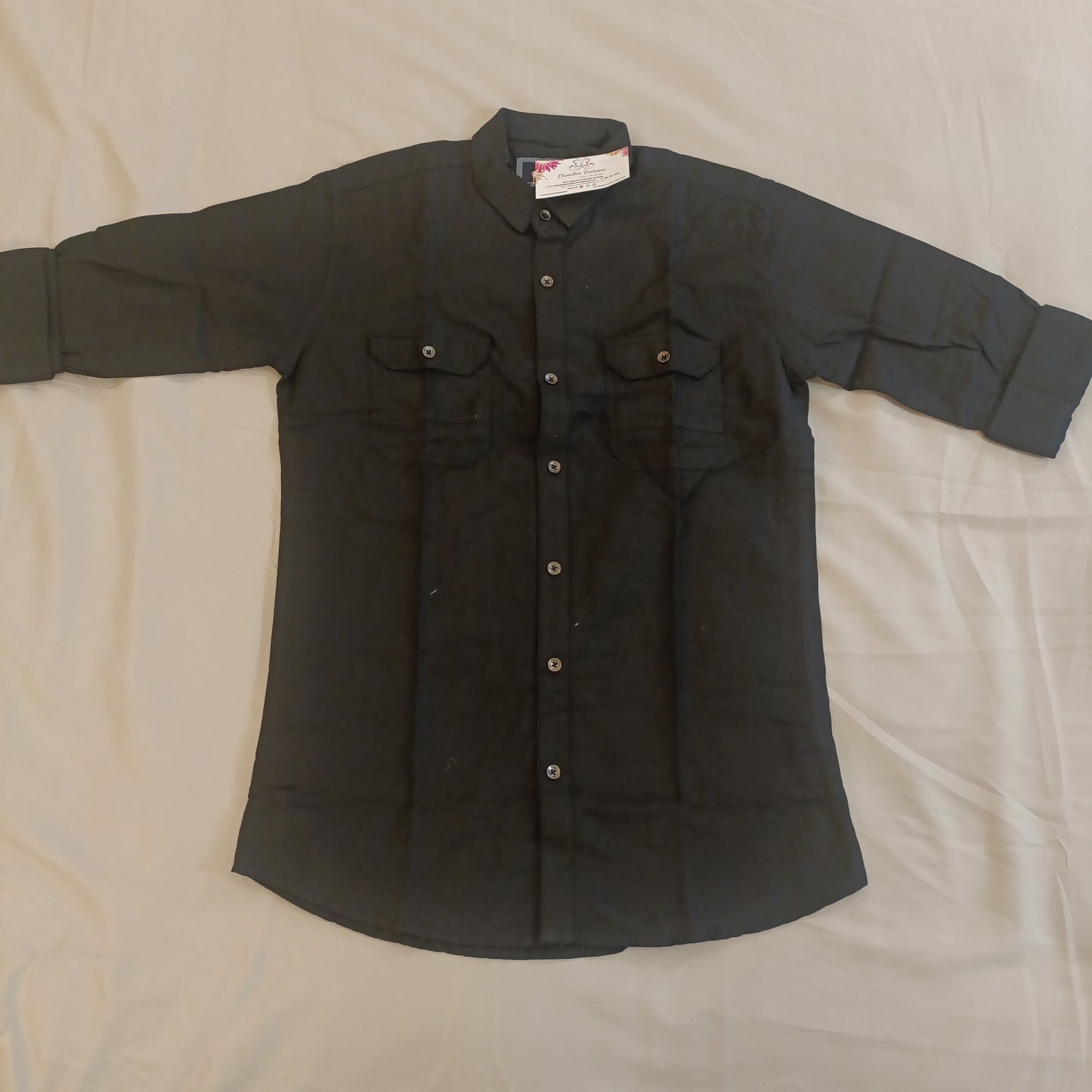 Attractive Black Shirt With Folded Sleeves And Two Pockets