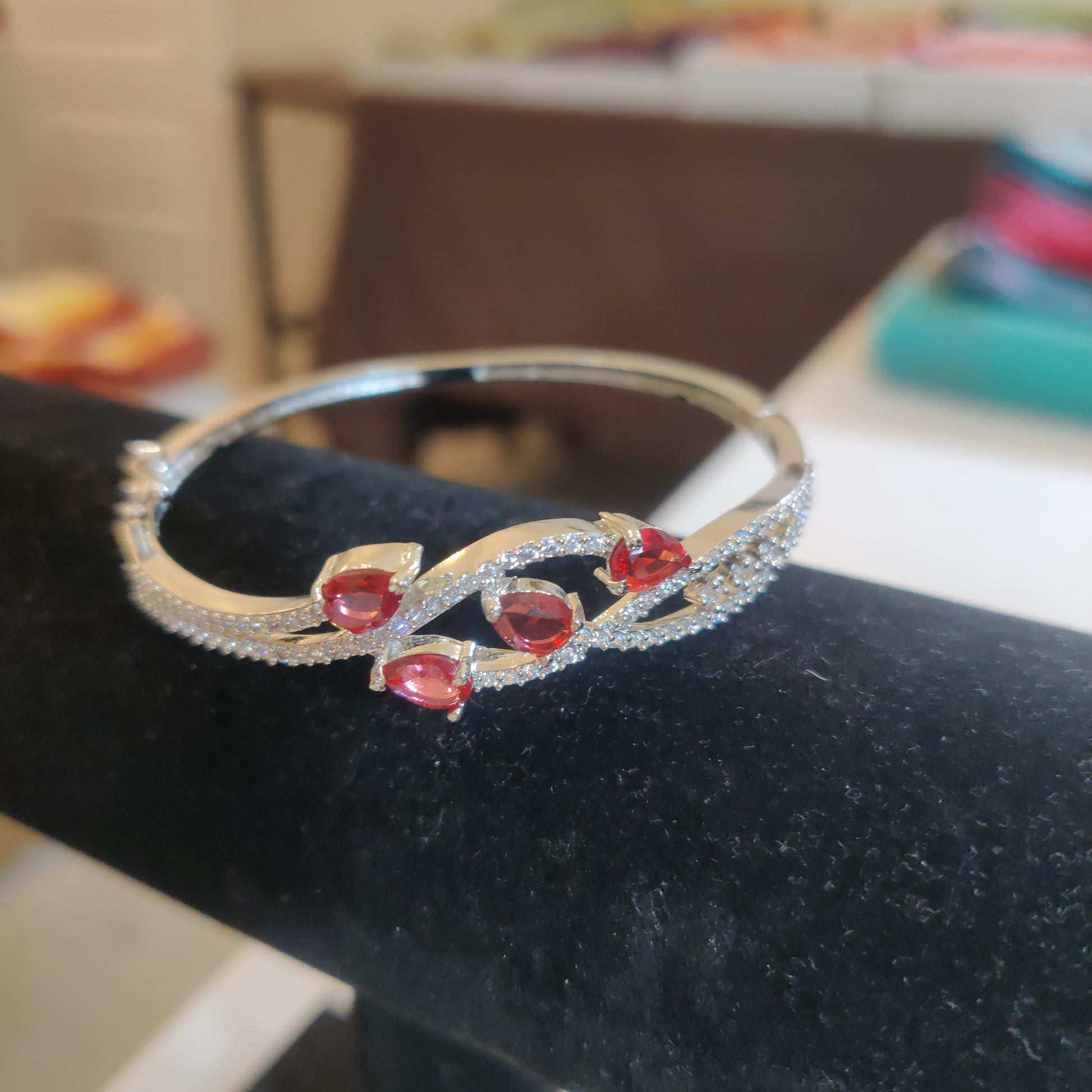 Beautiful AD Bracelet With Red Diamond Shaped Stones