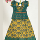 Alluring Green And Yellow Colored Self Design Silk Langa Sets For Girls
