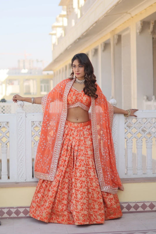 Attractive Orange Color Pure Dyable Viscose Jacquard Embroidered Lehenga For Women