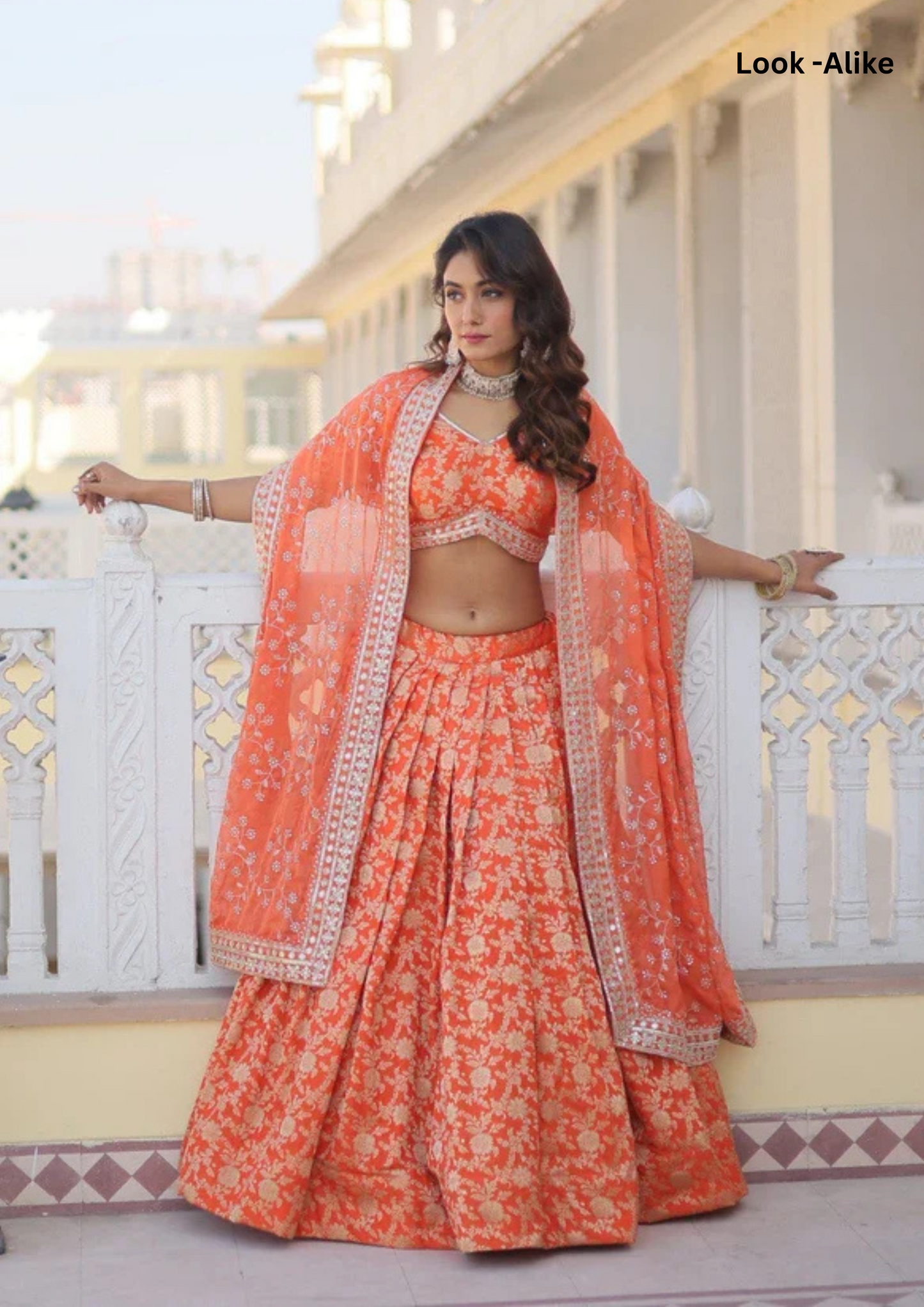 Attractive Orange Color Pure Dyable Viscose Jacquard Embroidered Lehenga For Women