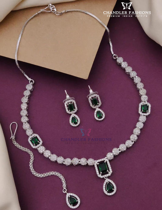 Alluring White And Green Color Stone American Diamond Necklace With Earrings And Tikka
