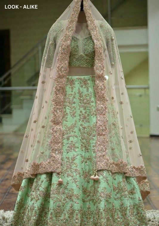 Stunning Pista Green Colored Designer Lehenga With Fancy Border Dupatta