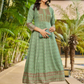 Attractive Light Green Color Rayon Foil Print Anarkali Gown With Embroidery Work