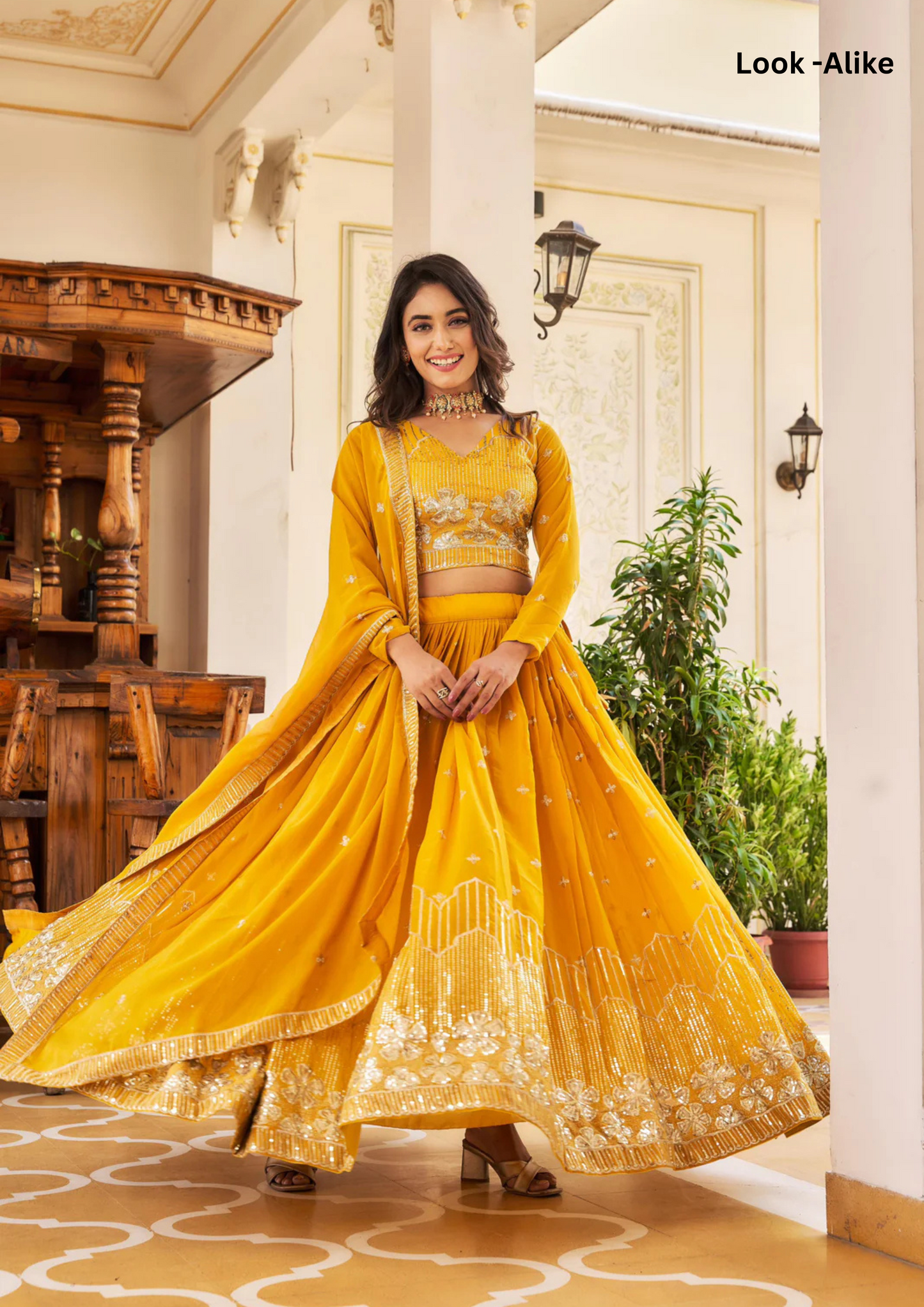 Charming Yellow Color Heavy Faux Georgette Embroidered With Sequins Lehenga Choli For Women