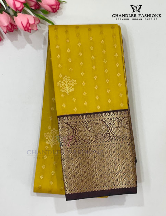 Appealing Yellow Color Pure Kanchi Silk With Maroon Peacock Motifs Border And Gold Zari Work Saree For Women