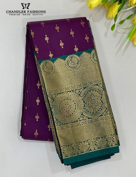 Stunning Dark Purple Color Pure Kanchi Silk With Green Color Traditonal Motifs Border And Gold Zari Work Saree For Women