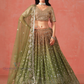 Elegant Mehendi Green Color Georgette With Sequins And Zari Embroidery Lehenga Choli For Women
