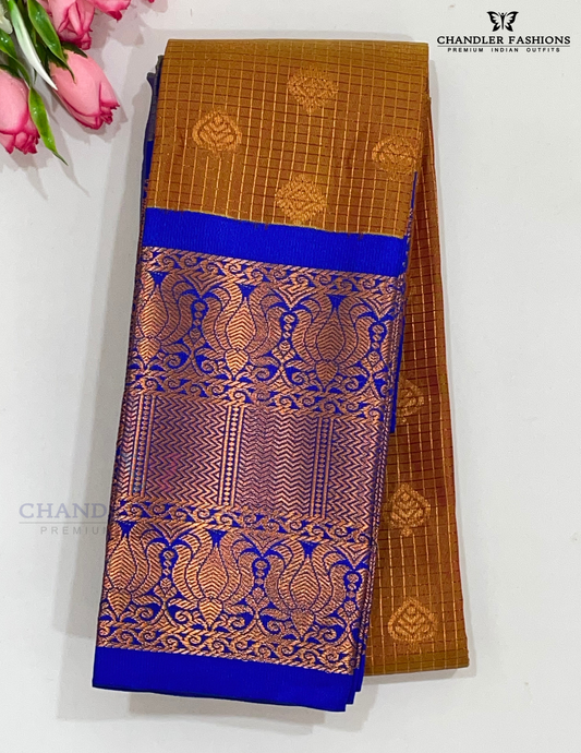 Charming Pumpkin Orange Color Pure Kanchi Silk With Indigo Blue Lotus Motifs Border And Gold Zari Work Saree For Women