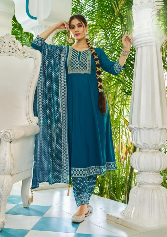 Dazzling Teal Blue Color Rayon Foil Print And Embroidery work Salwar Suits For Women