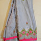 Grey Color Embroidery Georgette Saree With Contrast Pink Lace Border