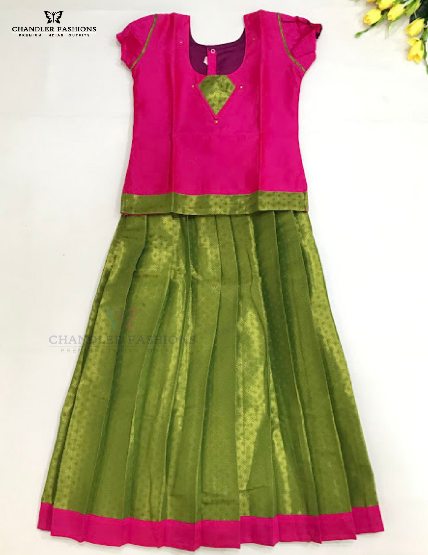 Stunning Pink And Parrot Green Colored Art Silk Langa Sets For Girls