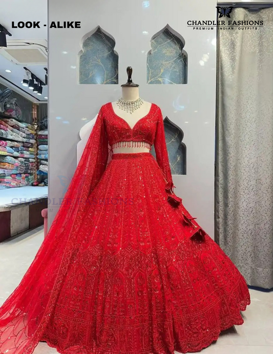 Beautiful Red Colored Soft Net Party Wear Lehenga Choli For Women