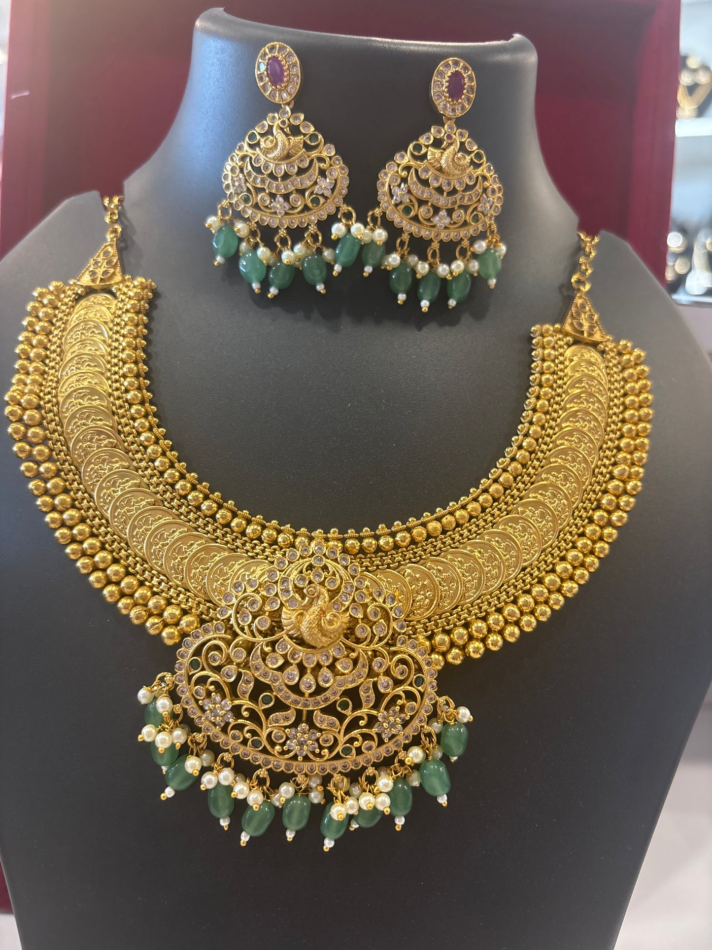 Stunning Gold Plated Kasu Necklace  set with Green and white pearls Hangings