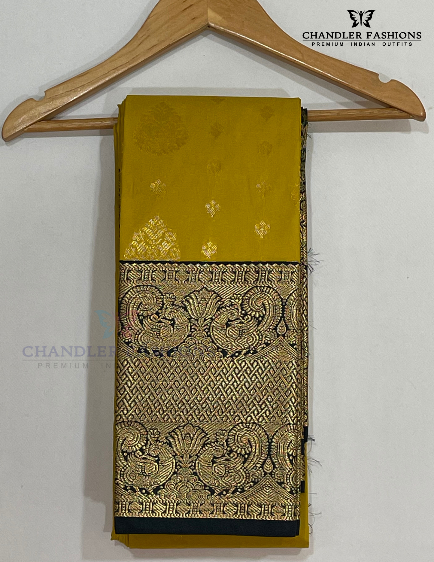 Yellow Color Pure Kanchi Silk With Dark Green Peacock Motif Border And Gold Zari Work Saree Near Me