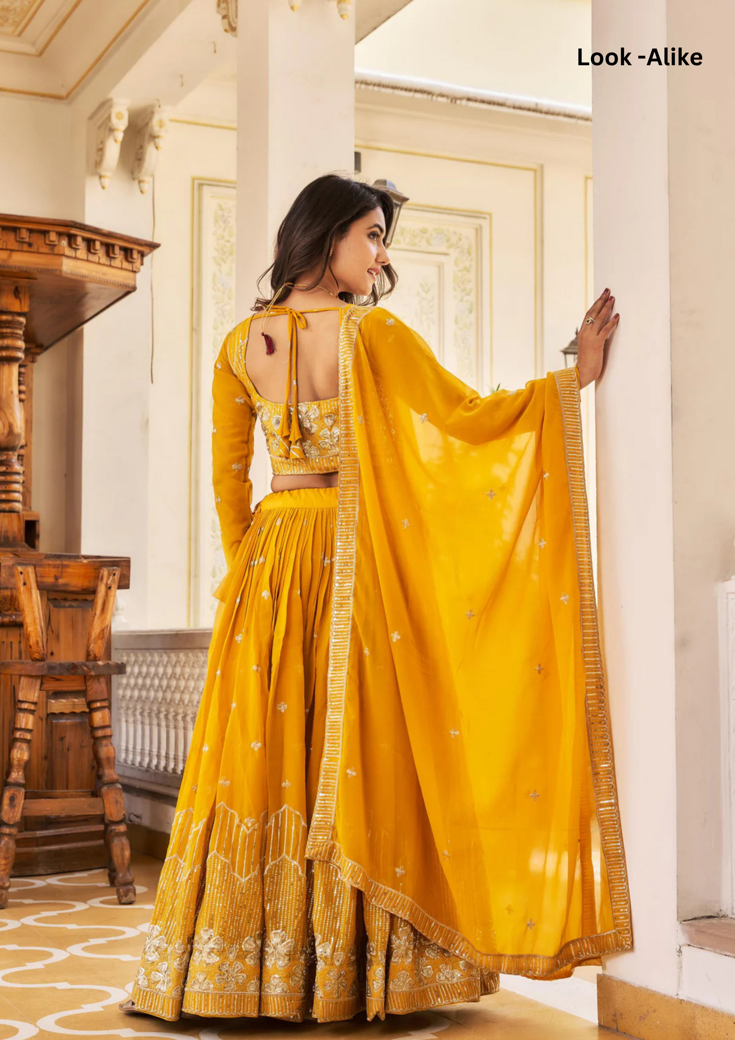 Charming Yellow Color Heavy Faux Georgette Embroidered With Sequins Lehenga Choli In Near Me