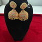 Alluring Pink And White Color Stones With Gold Plated Jhumkas For Women