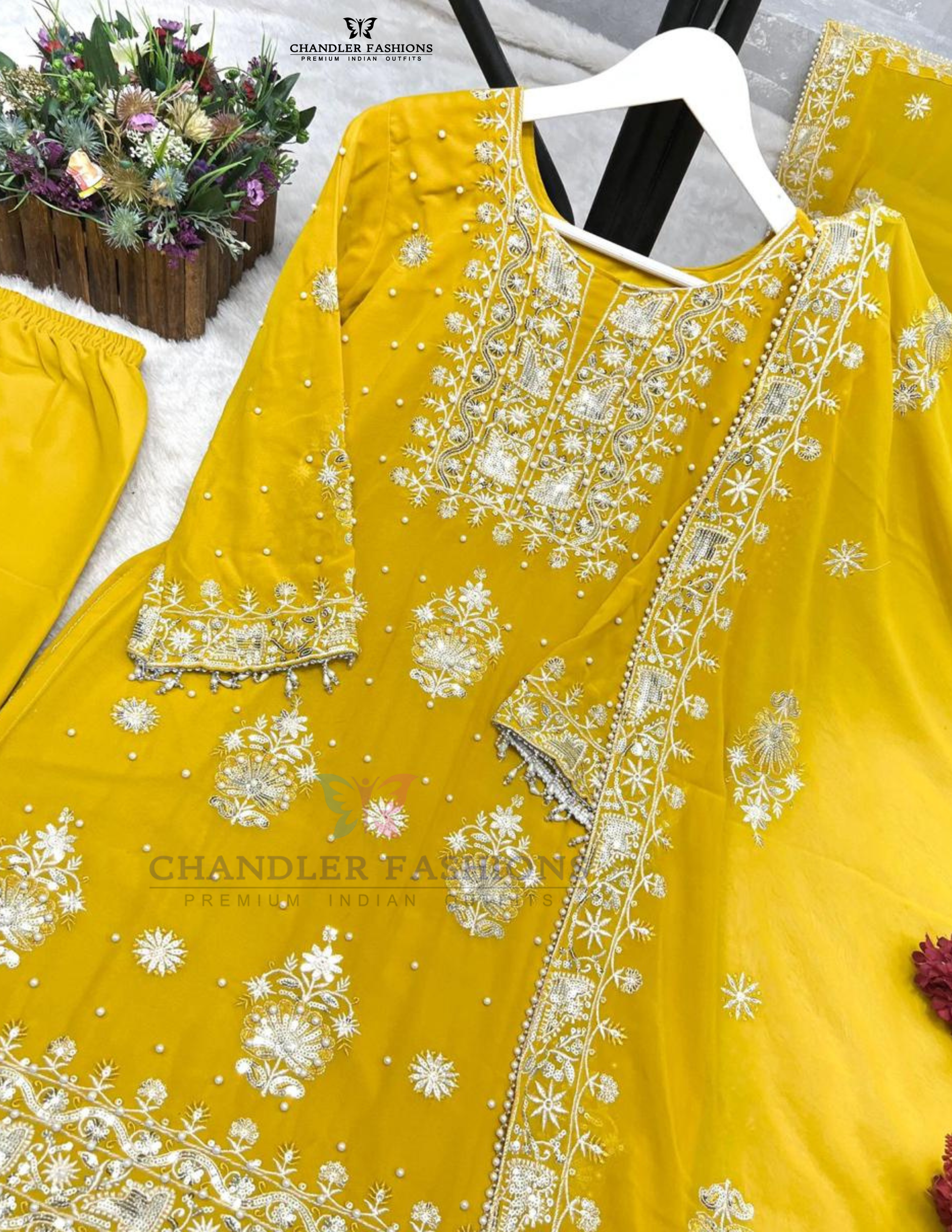 Yellow Color Georgette With Embroidery Work Palazzo Suits In Surprise