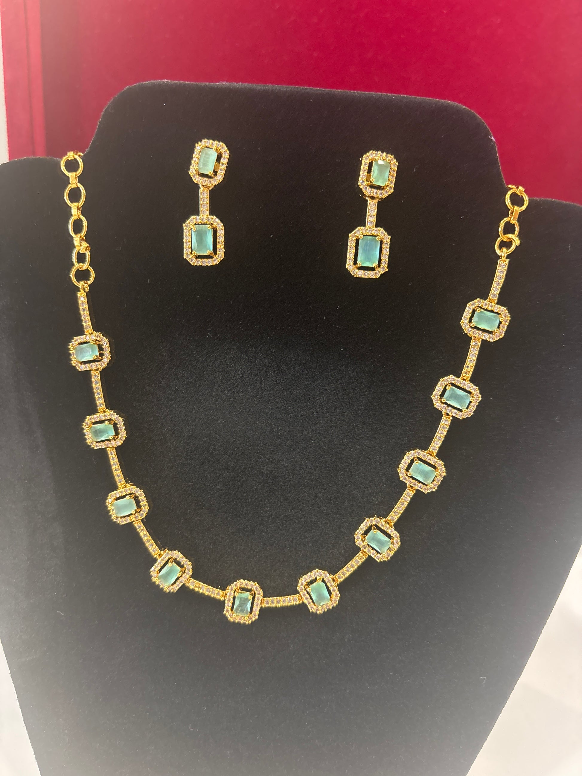 Amazing Teal Green And White Stones Studded Gold Plated Necklace With Earrings